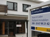 Gewerbeimmobilie Mehrfamilienhaus Verkehrsgünstig gelegenes Wohn-Geschäftshaus mit universell nutzbarer Laden- und Lagerfläche