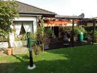 Wohnimmobilie Kauf Einfamilienhaus Feiner Walmdachbungalow mit Doppelgarage