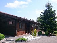 Wohnimmobilie Kauf Einfamilienhaus Dän. Blockbohlenholzhaus - Ebenerdig, großzügig, pflegeleicht