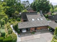 Wohnimmobilie Kauf Mehrfamilienhaus Architektenhaus mit Einliegerwohnung, Doppelcarport und ansprechender Gartenanlage
