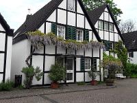 Wohnimmobilie Kauf Einfamilienhaus Einzigartige Doppelhaushälfte in Köln-Sürth am Rhein