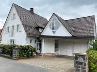 Wohnimmobilie Kauf Einfamilienhaus Exklusives Einfamilienhaus mit Wintergarten, Einliegerwohnung und Doppelgarage