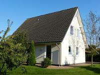 Wohnimmobilie Kauf Einfamilienhaus Junges Einfamilienhaus mit großem Garten und Doppelcarport