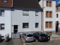 Wohnimmobilie Kauf Einfamilienhaus Gepflegtes Zuhause mit Ausbaupotenzial und großem Garten in idyllischer Lage