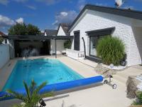 Wohnimmobilie Kauf Einfamilienhaus Traumhaus auf einer Ebene mit Pool