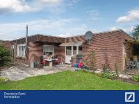 Wohnimmobilie Kauf Mehrfamilienhaus Bungalow, aufgeteilt in zwei Wohneinheiten in fußläufiger Entfernung zur Innenstadt.