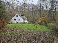 Wohnimmobilie Kauf Einfamilienhaus Außergewöhnlich und durchaus spannend! Ein Einfamilienhaus in grüner Lage.