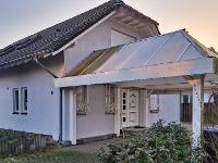 Wohnimmobilie Kauf Einfamilienhaus Einfamilienhaus mit Kamin, Garten und großzügigem Raumkonzept in familienfreundlicher Lage