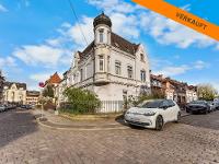 Wohnimmobilie Kauf Mehrfamilienhaus 3-Zimmer-Wohnung in charakteristischem Eckgebäude